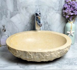 Beige marble round sink