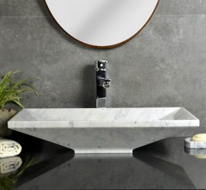 White marble upright sinks by Carrara